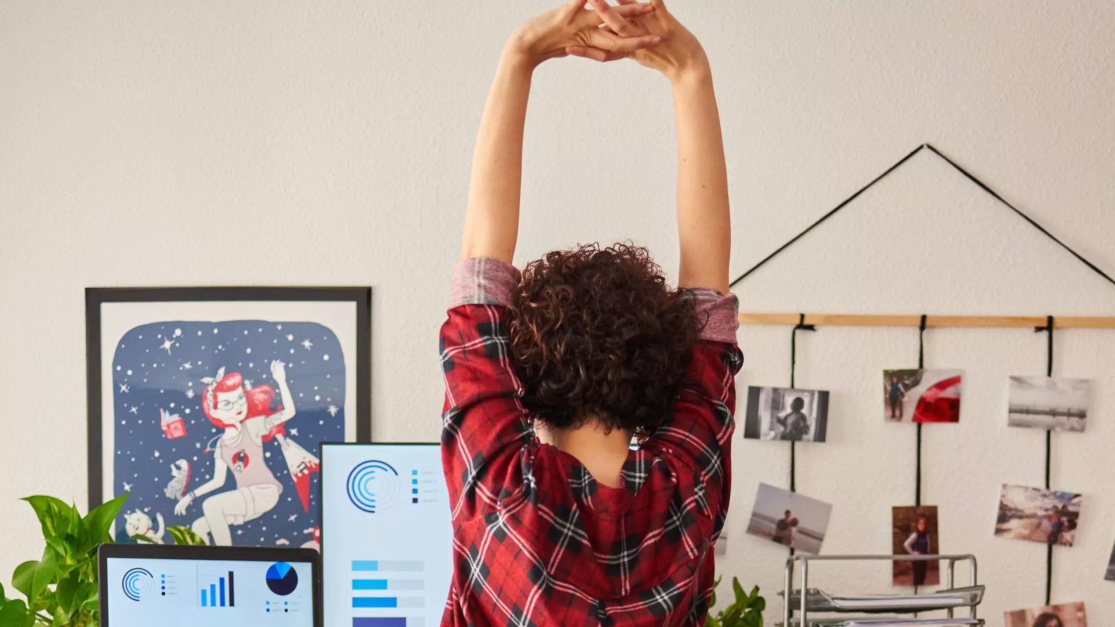 woman integrating minfulness and ergonomics into her workspace